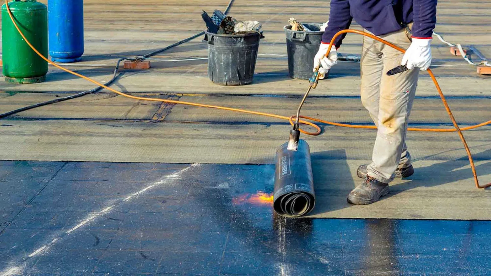 Modified-Bitumen Roof Repairs in Clovis at Laps and Blisters